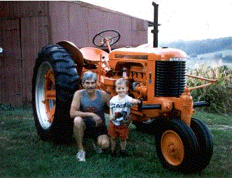 man and son in front of parade ready case sc