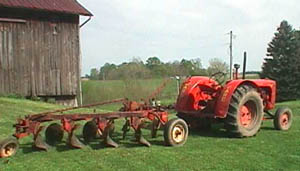 case tractor with 4 bottom plow