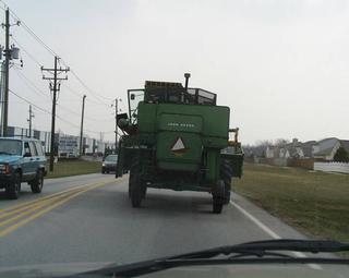 driving combine on highway