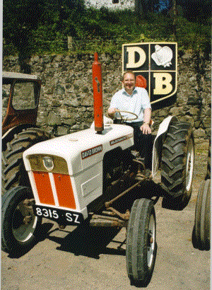 DB 70 with man on it and DB badge in background