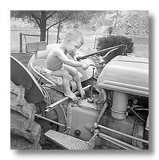 child on Ford 9N