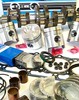 photo of Comprehensive kit for tractor models 1958 to 1964 501, 601, 701, 2000 with the 134 cubic inch gas engine with 3.4375 inch bore and 1\2 inch head studs. Includes: pistons, wrist pin bushings, piston rings, liners, con rod bearings, top and bottom gasket sets PLUS main bearings, thrust washers, front and rear seals. Kit INCLUDES NEW CRANKSHAFT.