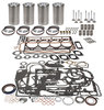 photo of 203 CID 4 cylinder diesel, 3.6  standard bore, injectors at angle in cylinder head. For engines SN# prior to 2939036. Engine Overhaul Kit. Contains CAST sleeves, for replacing original CHROME sleeves (flange thickness.040 ), pistons and rings, pins and retainers, pin bushings, gasket sets, crankshaft seals, intake and exhaust valves, valve keys, guides, springs, and retainers. For tractor models 356, MF65. Bearings and thrust washers must be ordered separately. Please see  engine bearings .