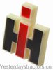 photo of Plastic  IH , red, black and white, 3-3\4 inch x 2-3\4 inch. For tractor models Cub Lo-Boy, 154, 184, 185, 140, 276, 404, 424, 434, 444, 504, 544, 553, 606, 654, 656, 666, 686, 706, 724, 756, 766, 786, 806, 824, 856, 886, 966, 986, 1066, 1086, 1206, 1256, 1466, 1468, 1486, 1586, 2400, 2404, 2424, 2444, 2500, 2504, 2544, 2606, 2656, 2706, 2756, 2806, 2856, 4156, 21206, 21256, Hydro 70, Hydro 86.