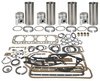 photo of Basic Engine Kit, less bearings (C169 CID Gas 4-cylinder engine). For tractors with stepped head pistons with 1.109 original pin diameter. 0.875 inch piston pin diameter supplied. If your engine has 1.109 inch piston pins, you will been to order 158977 thick walled bushings. Thicker walled pin bushing are used to accommodate 0.875 pins supplied. Model 300 to serial number 48048. Models: 300. Kit contains sleeves and piston kit, complete gasket set with crankshaft seals. ENGINE BEARINGS ARE NOT INCLUDED. NOTE: Does not include piston pin bushings 366883R92 for pin diameter 1.109 inch to 0.875 conversion. Order 158977 separately.