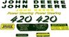 photo of For John Deere 420. Licensed John Deere product. This decal set has GREEN Letters\Numbers. This is a self adhesive, 12 piece set. It is printed on Mylar, not die-cut.